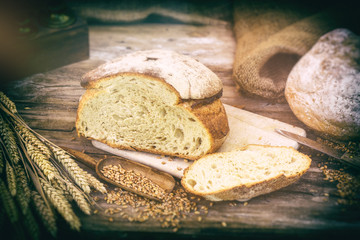 Wall Mural - Freshly baked bread in rustic setting