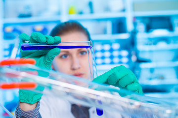 Poster - Woman science Assistant in laboratory with test of drink water