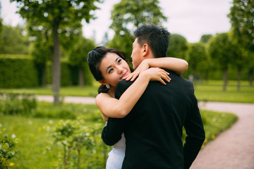 Wall Mural - Bride and groom on their wedding day outdoors