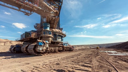Large excavator machine in the mine