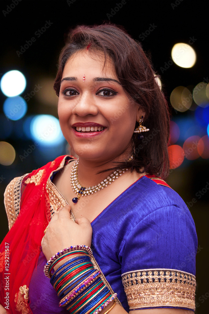 Indian Woman in traditional dress Stock Photo | Adobe Stock