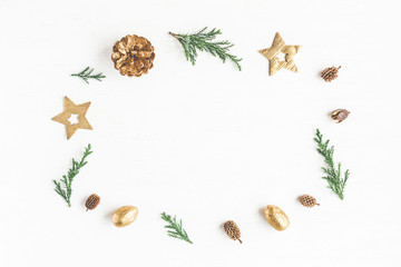 Christmas composition. Frame made of christmas decoration, cypress branches, pine cones. Flat lay, top view