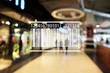Barcode on blurred shopping mall background. Wholesale and retail concept.