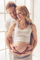 Wall Mural - Happy couple waiting for baby