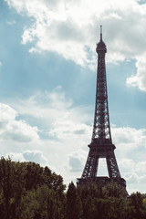 Wall Mural - Eiffel Tower. Paris. France. Famous historical landmark on the quay of a river Seine. Romantic, tourist, architecture symbol.