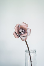 Paper Flower Against Neutral Grey Background