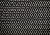 Plastic grille. Grid of audio amplifier background.