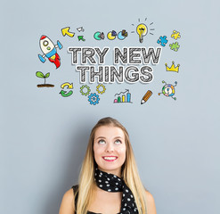 Wall Mural - Try New Things concept with happy young woman