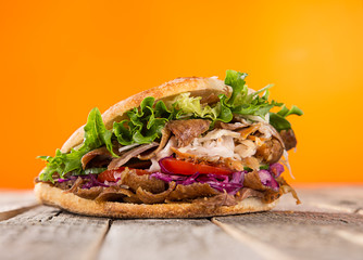 close up of kebab sandwich.