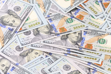 The hundred dollar banknotes as background