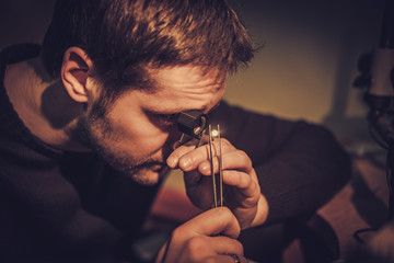 Jeweler during the evaluation of jewels