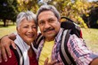 An elderly couple posing for a selfie