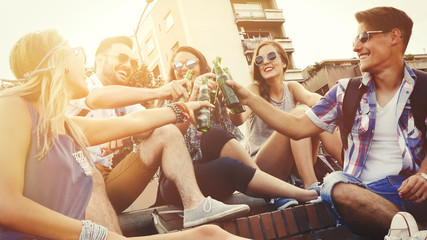 Group of friends drinking outdoors