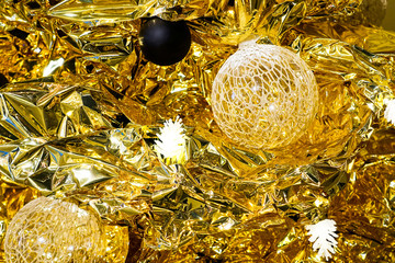 Christmas decorations on a gold foil