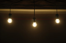 Five Included Light Bulbs In A Dark Room