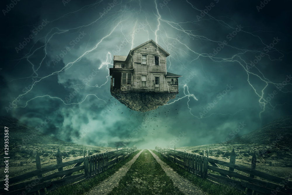 Rapture surreal concept. Ghost house ripped from the ground flying above a country road in a stormy day with lightnings in the sky. - obrazy, fototapety, plakaty 