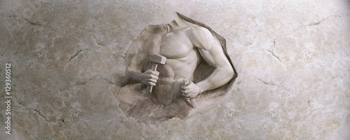 Fotografía epic background of athletic man cuts his body of marble stone