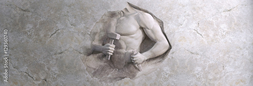 Fotografía epic background of athletic man cuts his body of marble stone
