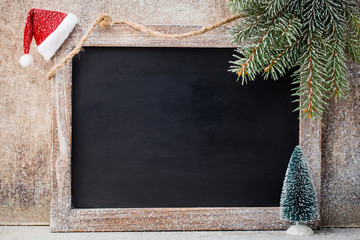 Wall Mural - Christmas chalkboard with decoration. Santa hat, stars,  Wooden