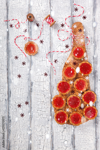 Christmas Baking Cookies With Marmalade On White Wooden Background