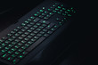 © DedMityay - Green lighting keyboard in the dark