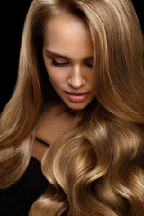 Wall Mural - volume hair. beautiful woman model with long blonde hair
