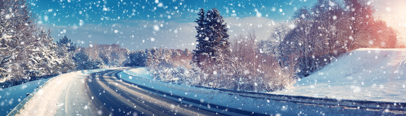 Car on winter road covered with snow