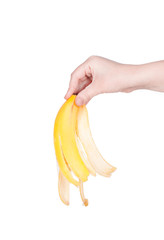 Banana skin in hand isolated on white background