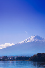 fuji mountain view from the lake kawaguchiko on blue sky backgro