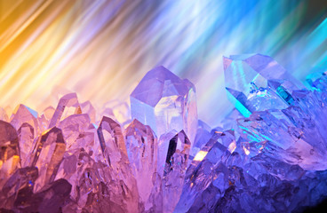 sparkling multi-colored background with rays of light and cryst