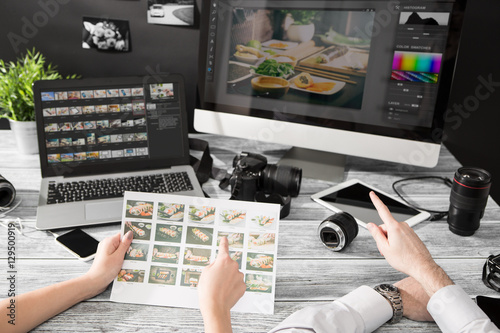 Fotomural Photographers computer with photo edit programs.