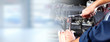 © grinny - Hands of car mechanic in auto repair service.