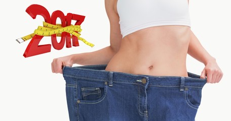 Poster - Composite image of midsection of female wearing old pants after 