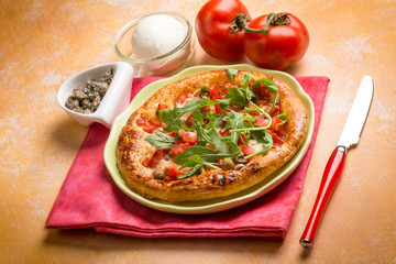 Poster - pizza with fresh tomatoes mozzarella arugula and capers