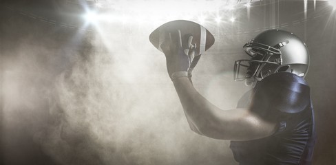 Poster - Composite image of american football player catching ball