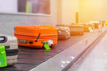 Suitcase Or Luggage With Conveyor Belt In The Airport