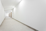 Fototapeta  - Long white clean hallway