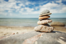 Stack Of Stones On The Seaside In Summer