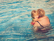 © nadezhda1906 - grandmother and little granddaughter learning to swim