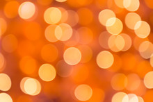 Blur Orange Bokeh Background From The Lights Of Christmas Tree