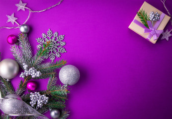 Wall Mural - Purple Christmas background with a present