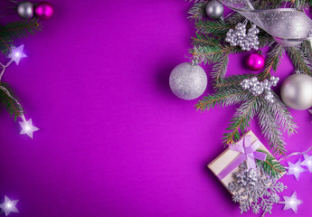 Wall Mural - Purple Christmas background with a present