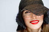 Fototapeta  - Young woman in hat 