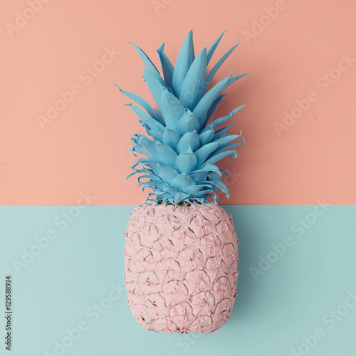 Fotografie, Obraz Pink pineapple on pink and blue pastel background. Minimal style