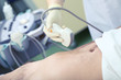 © sudok1 - Ultrasound exam of patient carrying out by female doctor