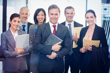 Poster - Portrait of business team with document and organizer