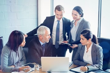 Poster - Businesspeople interacting in conference room