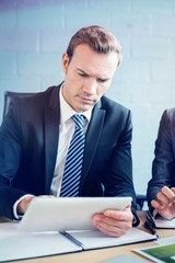 Poster - Businessman using digital tablet