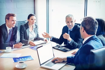 Poster - Businesspeople discussing together in conference room