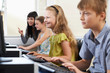 © highwaystarz - Elementary Pupils In Computer Class With Teacher